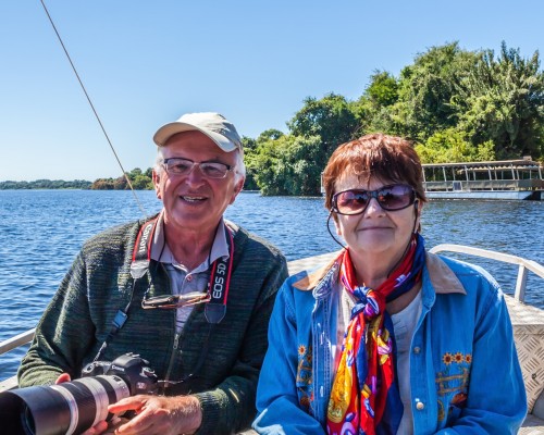 senior couple in a boat on a river